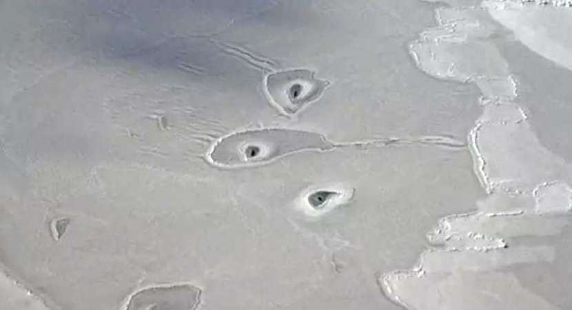Baffled NASA scientists begins puzzle over mysterious ice hole circles in Arctic Baffled NASA scientists begins puzzle over mysterious ice hole circles in Arctic