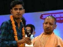 CM Yogi Adityanath presented him a cheque of Rs 1 lakh for his hard work and achievement.