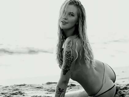 Model Ireland Baldwin flaunting red rose tattoo Model Ireland Baldwin flaunting red rose tattoo