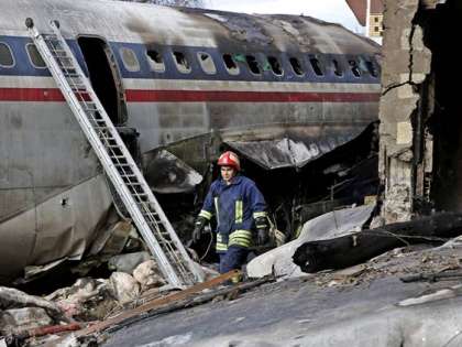 An Iranian rescue worker at the site of a Boeing 707 cargo plane crash, at Fath Airport about 40 kilometers (25 miles) west of Tehran, Iran, Monday, Jan. 14, 2019. An Iranian rescue worker at the site of a Boeing 707 cargo plane crash, at Fath Airport about 40 kilometers (25 miles) west of Tehran, Iran, Monday, Jan. 14, 2019.