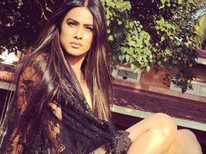 Nia Sharma's backless red dress is a must watch on internet Nia Sharma's backless red dress is a must watch on internet