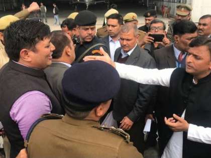 Akhilesh Yadav stopped at Lucknow airport, SP leaders stage protest Akhilesh Yadav stopped at Lucknow airport, SP leaders stage protest